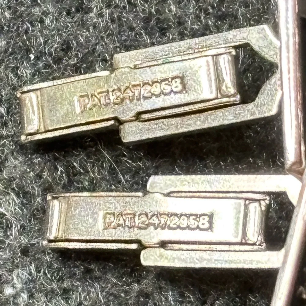 Silver and Black Square Cufflinks with Fleur-de-Lis and Curved Design